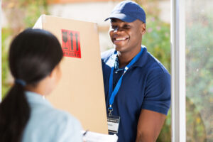 Man delivering box to home