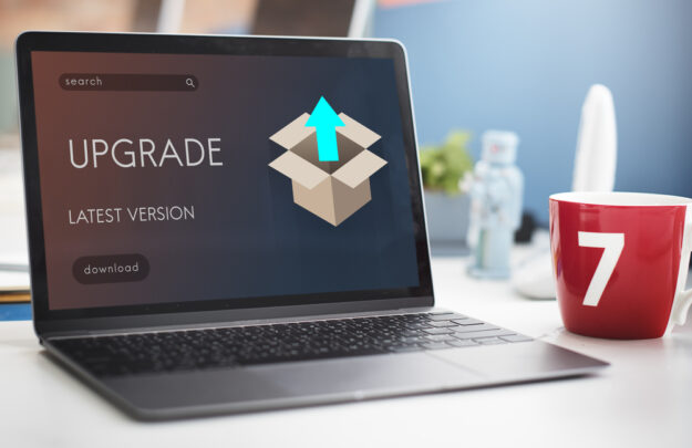 laptop-with-computer-software-upgrade-on-screen Laptop With Computer Software Upgrade on Screen
