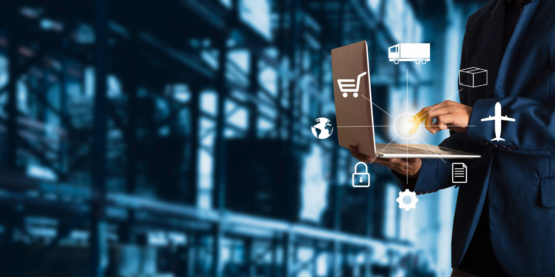 Businessman manager using laptop check orders online goods worldwide for network with Modern Trade warehouse logistics. Industry of logistics network concept.